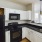 kitchen that overlooks living room