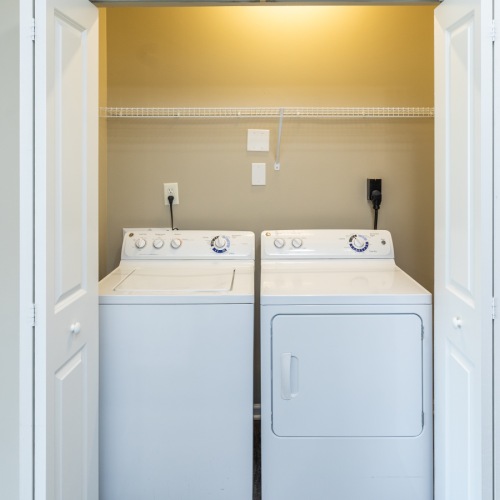 Closet with side by side washer and dryer